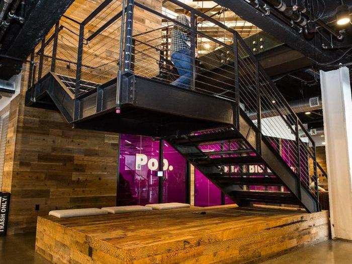 A staircase in the center of the office lets employees move between floors.