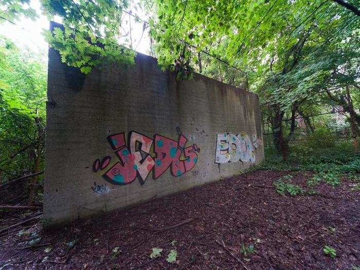 But signs of illegal visitation are peppered about, including this graffiti on a wall ball court.