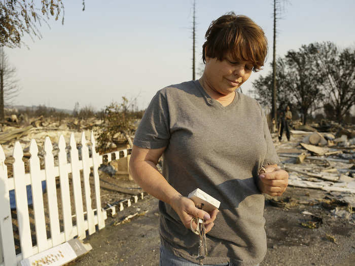 Tammy Christiansen searched the remains of her home and found a glimmer of hope.