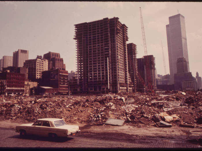 Building construction has long contributed to air pollution in NYC, though the EPA now regulates emissions from construction equipment. This 1973 photo shows waste from a construction site on Manhattan