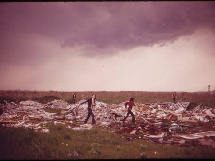 In Brooklyn, a Gravesend Bay landfill and incineration plant served as a playground for the boys pictured below. Another landfill in Staten Island, called Fresh Kills, was the largest in the world. By 2036, it will be reclaimed as a park.