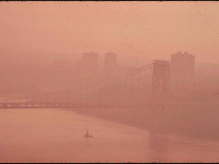 Air pollution was also a huge issue in the city. As seen in this 1973 photo, smog obscures the George Washington Bridge.