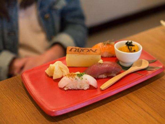 The presentation was simple and clean. When the server set the plates down in front of us, he rattled off the exotic ingredients used in each piece. The sashimi glistened before us.