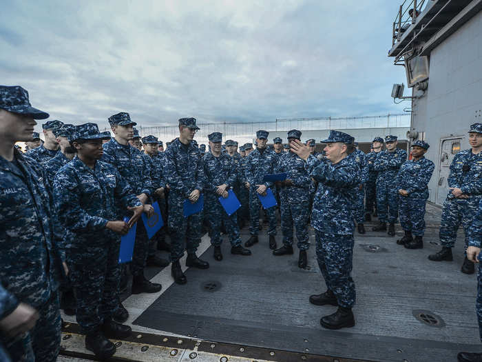 Its crew is 37 officers and 327 enlisted sailors.