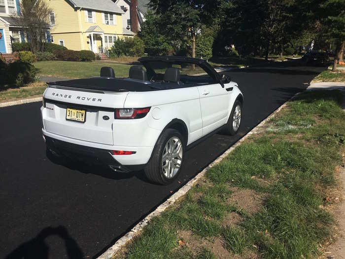 When not in use, the roof tucks away neatly in a compartment behind the rear seat.