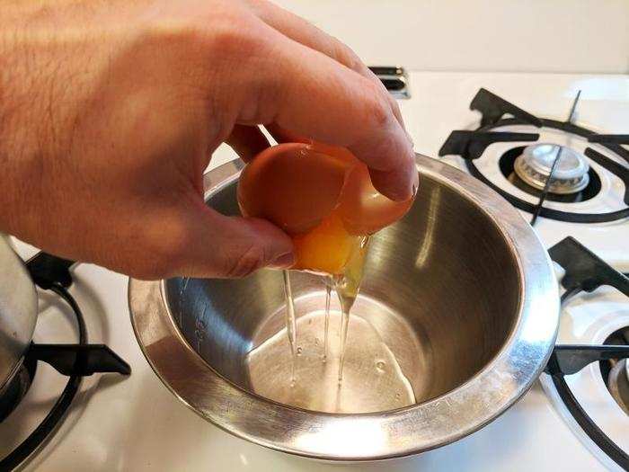 Next, one egg. The idea behind this process is that albumin in egg whites can absorb coffee