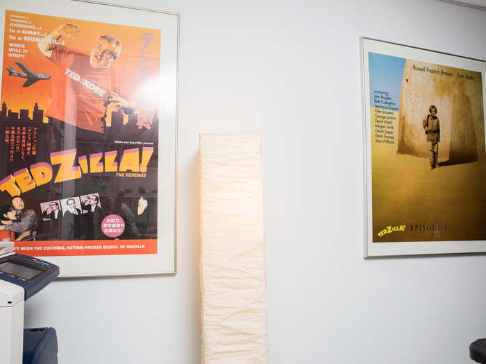 The hallway includes a roomy supply closet where two posters from the original TED conferences hang on the wall. On the left is Richard Saul Wurman, the founder of TED, taking over a city.