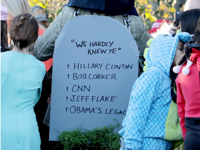 The event was also marked with festive political messages, like this gravestone of Trump