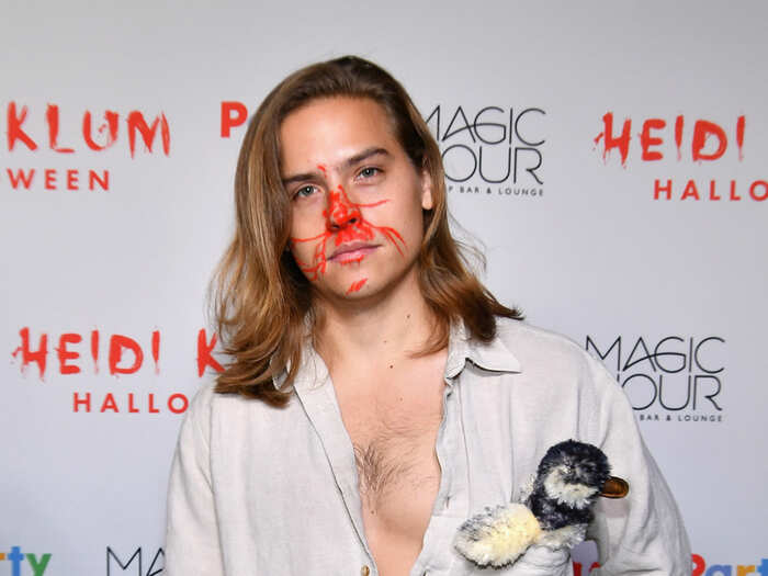 With his costume, Dylan Sprouse made a reference to Fabio’s infamous run-in with a goose while riding a roller coaster in 1999.