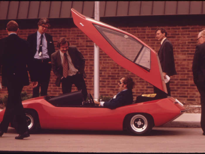 In 1973, the EPA held an exhibit of low-pollution vehicles in Ann Arbor, Michigan, largely due to concerns about emissions from gas and diesel vehicles. The men pictured below are checking out a "Sundancer," an experimental electric car.