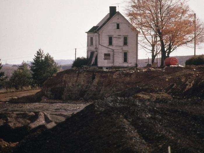 Near Cadiz, Ohio, a coal company stripped mined the land surrounding this abandoned house.