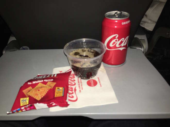 Soon after takeoff, the cabin crew commenced with snack and beverage service.