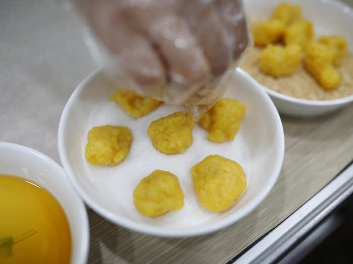 Here, seokdujeon is made. These small treats are made by mixing cornmeal powder and water — no baking needed.