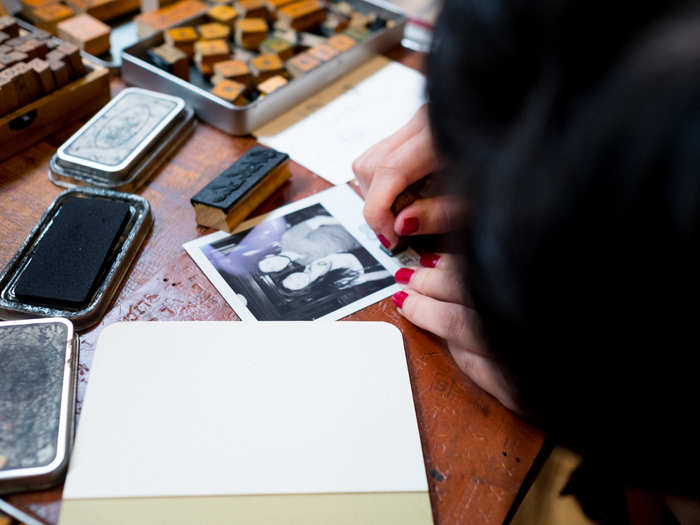 The shop runs special workshops to teach people how to cut their own rubber stamps or linoleum prints. We used the letter stamps they had in store.