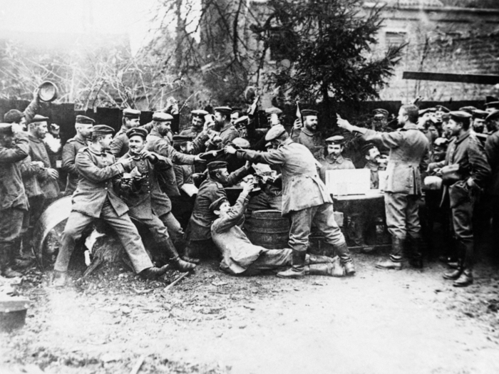 Merriment and camaraderie also endured. Here, German soldiers celebrate Christmas on the front line in 1914.