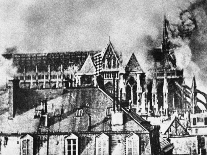 World War I was a total war — everything was a potential target, including Reims cathedral in France, pictured here amid falling bombs in September 1914.