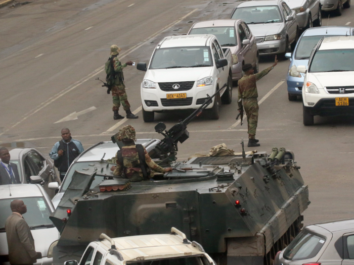 By morning, tanks and armored personnel carriers blocked traffic and set up checkpoints all over Harare.