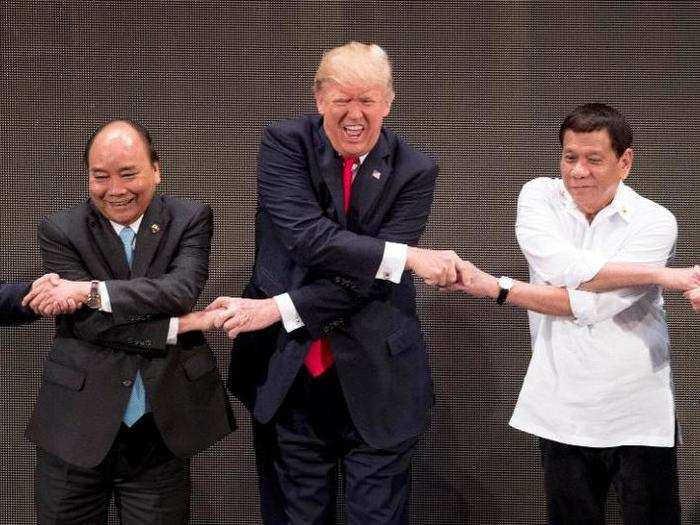 Trump just got back from the Philippines, where he attended the ASEAN summit with other regional leaders. Everyone on stage was instructed to do the "ASEAN-way" handshake, and apparently Trump, Vietnam