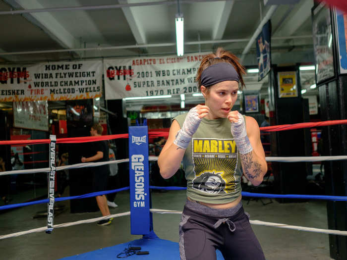 Karyn Toffolo, a wellness coach and aspiring amateur fighter, trains at Gleason