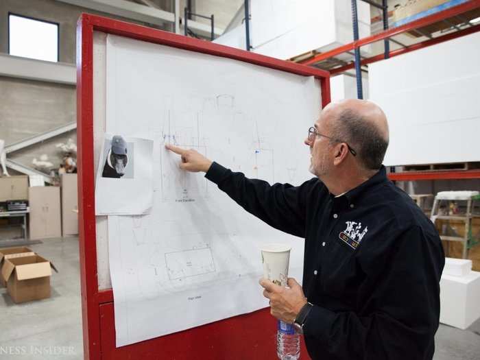 Once a rendering is ready to come to life, the sketch is moved out onto the warehouse floor. Here, Piper shows a sketch of the massive turkey and goose float that is almost complete.