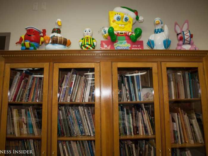 The studio has a library of books, mostly for children, that the artists use as a reference to help turn two-dimensional characters into real-life, 3D figures.