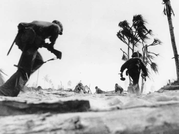 Disjointed shelling and bombardment continued for several hours. The landing time was delayed, first to 8:45 a.m. and then to 9 a.m. Just before 9 a.m., a Marine scout-sniper platoon and combat engineers darted onto the long pier that jutted into the lagoon, making quick work of its defenders.