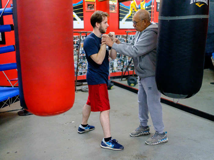 The key to boxing is repetition, according to Silverglade. "There are only so many different ways to stand or punch," he said. The goal is break bad habits, like my hand-dropping (pictured here) and turn the right actions into "reflexes."