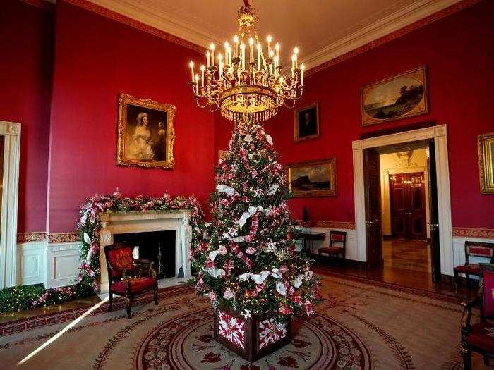 A smaller Christmas tree is on display in the Red Room. It