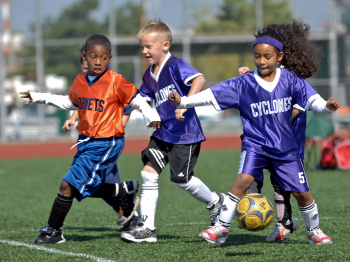 Kids can participate in a youth soccer league, just one of the many recreational activities available to families and children.