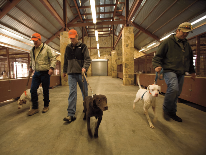 The dogs can be housed in the 11,000-square-foot kennel on the property. It has a veterinary lab, an office, a meat-processing center, and an exercise area for the dogs.