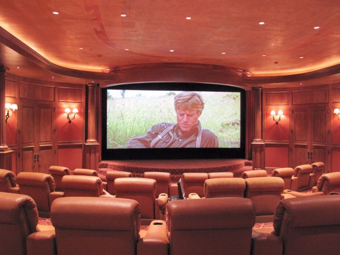 A home theater has seats for 30.