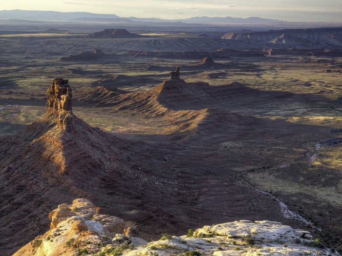 This is the scenic "Valley of the Gods," boasting wide open spaces and towering sandstone buttes. The area rivals Monument Valley, though it is far less traveled.