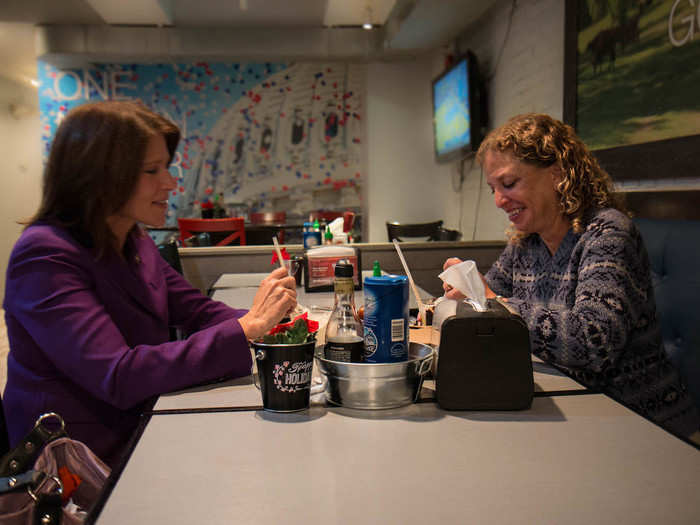 It was Democratic Congresswomen Debbie Wasserman Schultz and Cheri Bustos enjoying milkshakes. Wasserman Schultz was eating the Oreo shake, and Bustos was eating the toasted marshmallow shake.