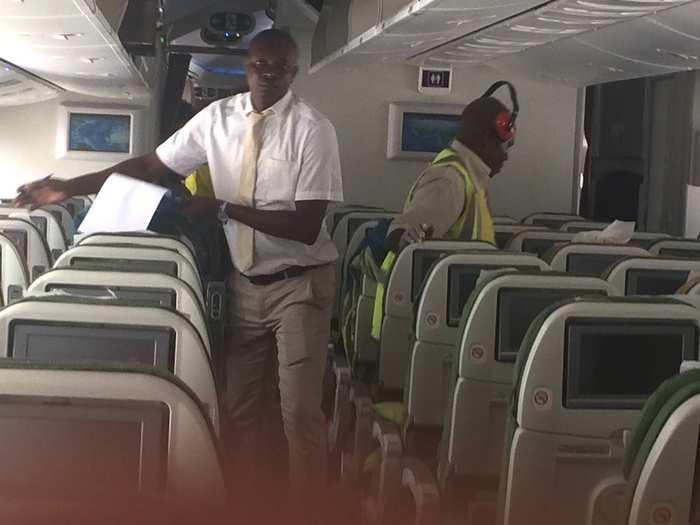 As we waited about an hour on the tarmac, the Ethiopian crew picked up garbage, vacuumed, and straightened messy seats. One detail I appreciated: Even while clad in neon vests, the men all wore ties.