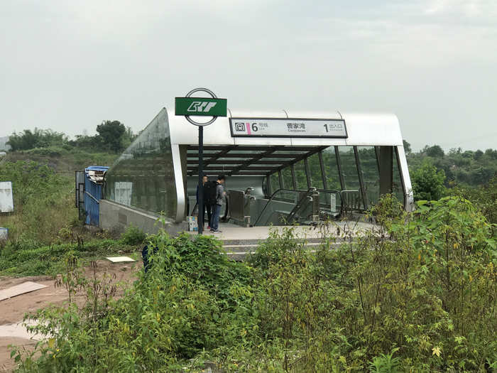 An exit of a subway station, currently in operation, is seen in a sparsely populated area in Chongqing, China.