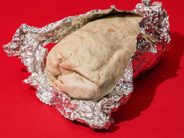 So, Qdoba already has that going for it. The burrito is solidly wrapped, and I notice that there are no tears or sogginess, unlike Chipotle