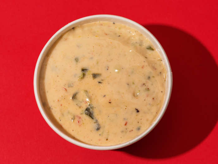 There are two kinds of queso at Qdoba (Need I even go on at this point? Qdoba is clearly better): Three Cheese and "Queso Diablo." The three-cheese queso has a savory smokiness to it, and while it does pack a little punch, it