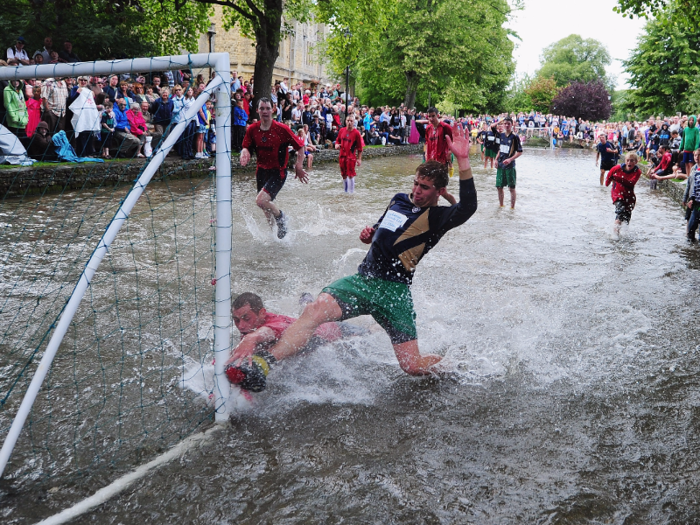 If the thought of beach rugby brings you out in a hot sweat, how about cooling off with a game of river football?