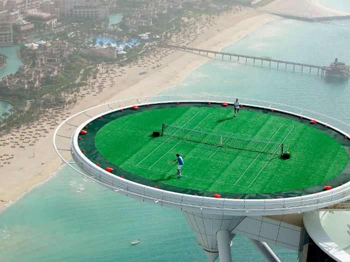 From within the depths of a mountain to the dizzying heights of the Burj Al Arab helipad in Dubai, we now find Roger Federer and Andre Agassi playing tennis at altitude.