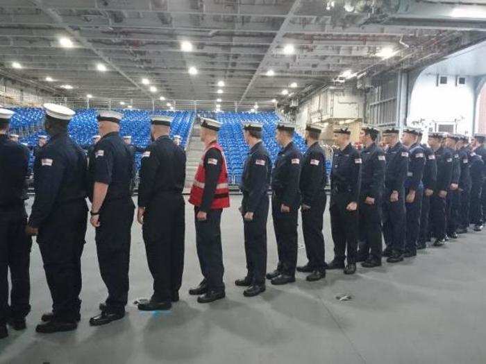 Then we saw sailors file in to practice drill ahead of the big commissioning ceremony.