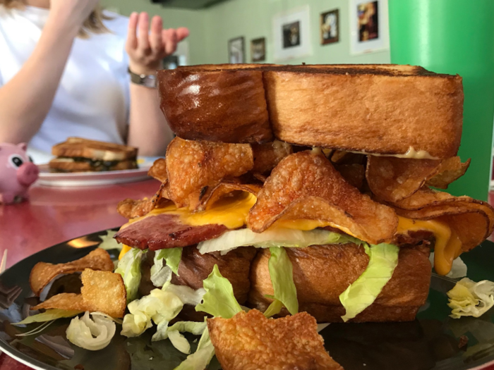 This is a monstrously thick sandwich. I basically had to unhinge my jaw to eat it, and I got mustard and mayo all over my face as I smashed the sandwich into my mouth. But the decadent combination of fried meat and American cheese, cut with the chips and hot mustard, was nothing less than heavenly.