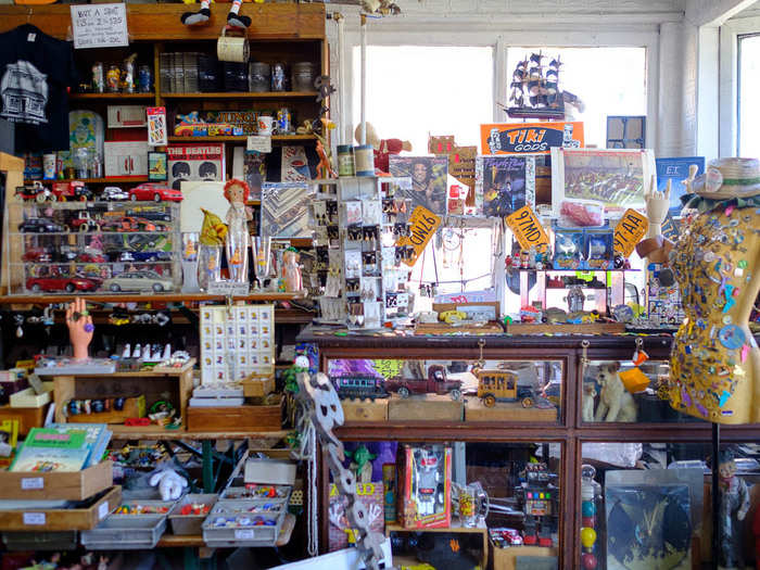 The store is a wonderland of postcards, toys, art, electronics, cameras, and jewelry from the last 50+ years. It started as Dan