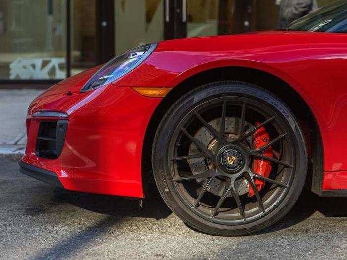 Check out those fat red brake calipers and ventilated brakes discs. They provide ample stopping power. Also note that the front end can be raised to preserve the aerodynamic elements (they don