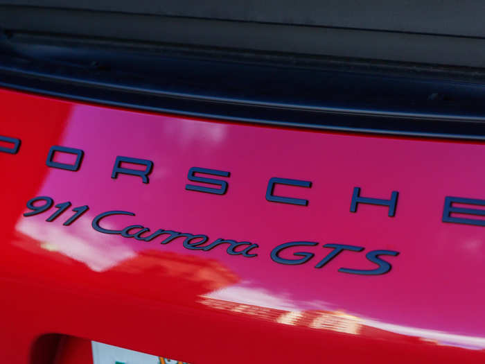 What we have hidden away back there is a 3.0-liter, twin-turbocharged, flat-six boxer engine, cranking out 450 horsepower and 405 pound-feet of torque. The power is piped through, in this case, a seven-speed stick. Our GTS was rear-wheel-drive.