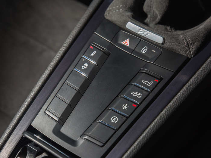 Messing with these buttons enables you to firm up the suspension, open up the exhaust note, switch off the traction control, and raise and lower the vehicle and the spoiler. There