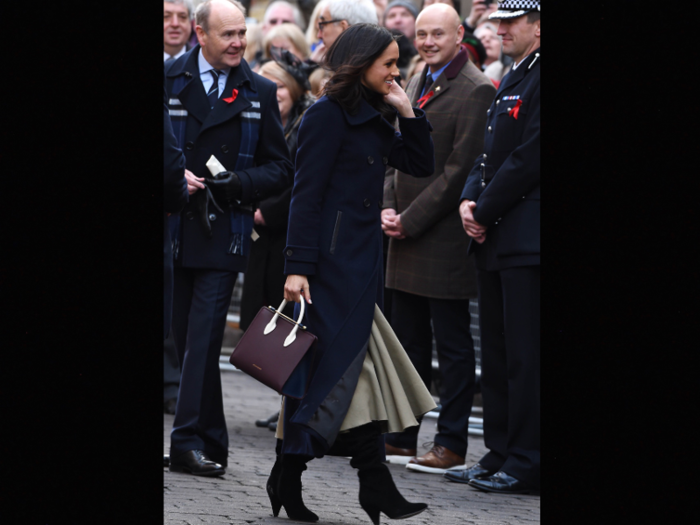 Still, she brings her fashion sensibility in with the details — look at those boots!