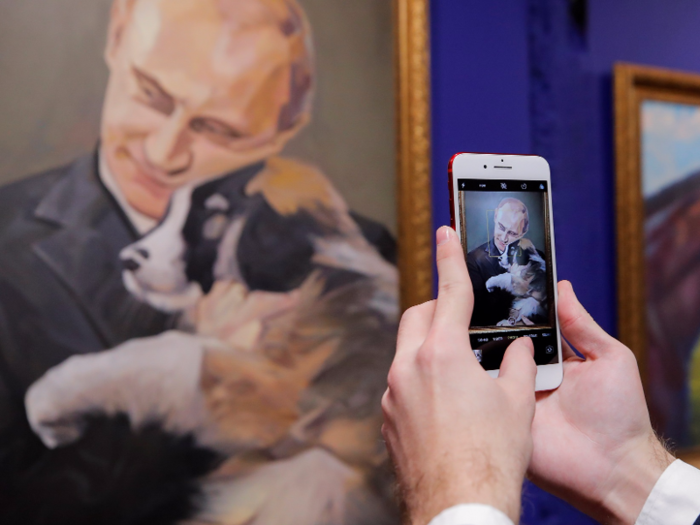 Here Putin — a known dog-lover — snuggles a puppy that was gifted to him from the president of Turkmenistan.