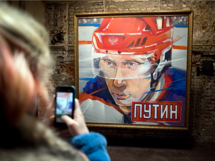 Putin is depicted as an ice hockey star.