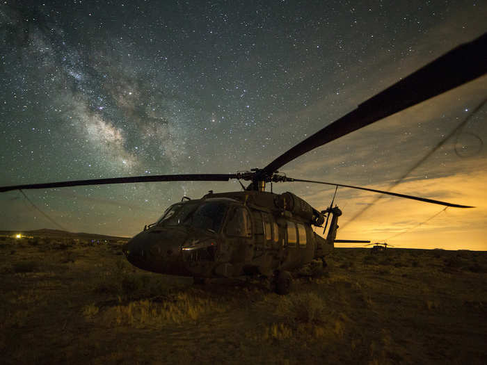 A UH-60 Blackhawk helicopter sits under Milky Way galaxy in the Mojave Desert on May 30 at Fort Irwin.