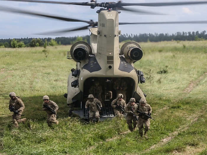 Soldiers conduct sling load and air assault training with M777A2 Howitzers at Bemowo Piskie Training Area near Orzysz, Poland on June 7.